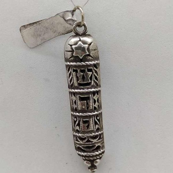 Handmade sterling silver Mezuzah pendant Shaddai cutout letters designs. Dimension 0.9 cm X 0.4 cm X 3.8 cm approximately.