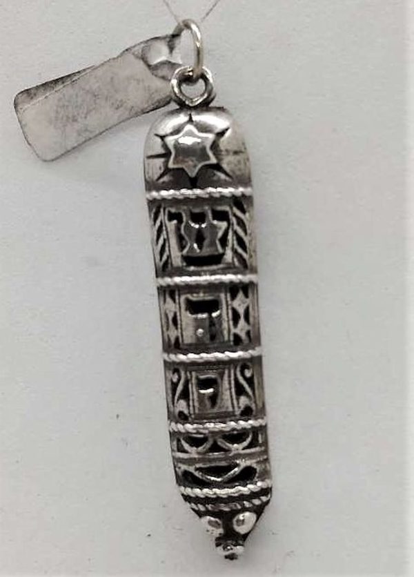 Handmade sterling silver Mezuzah pendant Shaddai cutout letters designs. Dimension 0.9 cm X 0.4 cm X 3.8 cm approximately.