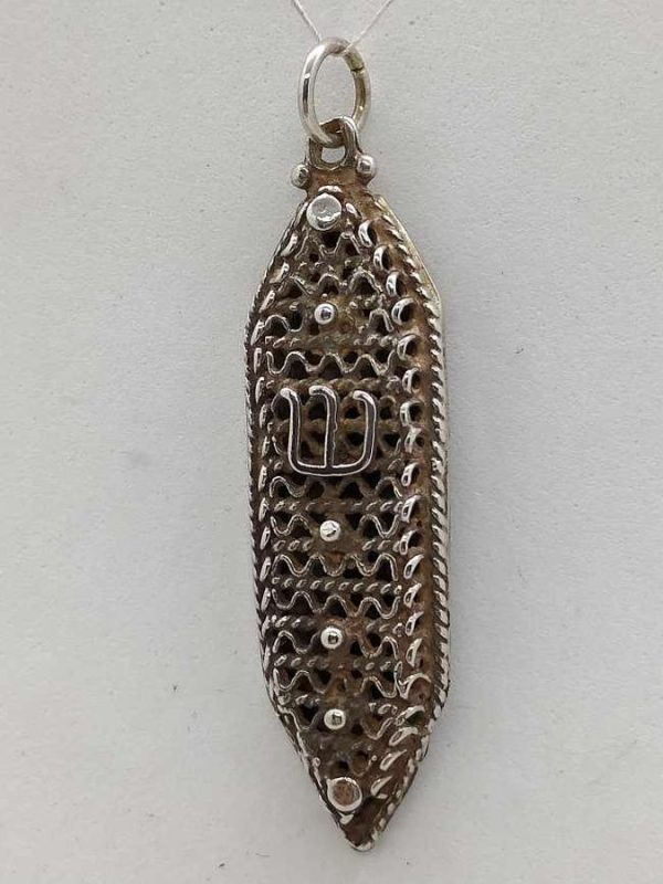 Handmade sterling silver Yemenite filigree Mezuzah pendant with Yemenite filigree design. Dimension 1.2 cm X 0.4 cm X 4 cm approximately.