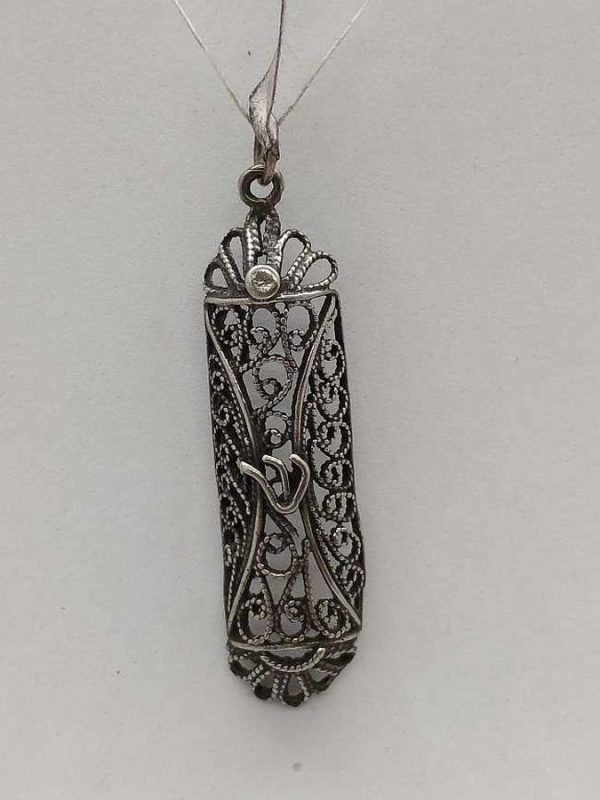Handmade sterling silver Mezuzah pendant open back with fine Yemenite filigree. Dimension 1 cm X 0.5 cm X 3.7 cm approximately.