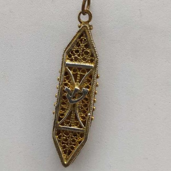 Sterling Silver Mezuzah pendant gold plated handmade with fine  Yemenite filigree gold plated. Dimension 1 cm X 0.4 cm X 3.4 cm approximately.