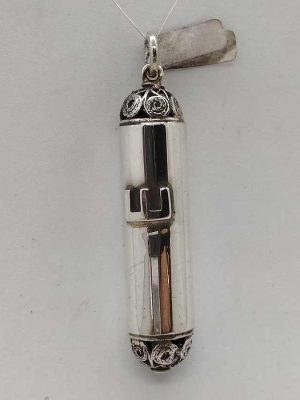 Sterling silver Mezuzah pendant filigree edges handmade by S. Ghatan(Katan) with Yemenite filigree edges up and down, diameter 1 cm X 4.1 cm approximately.