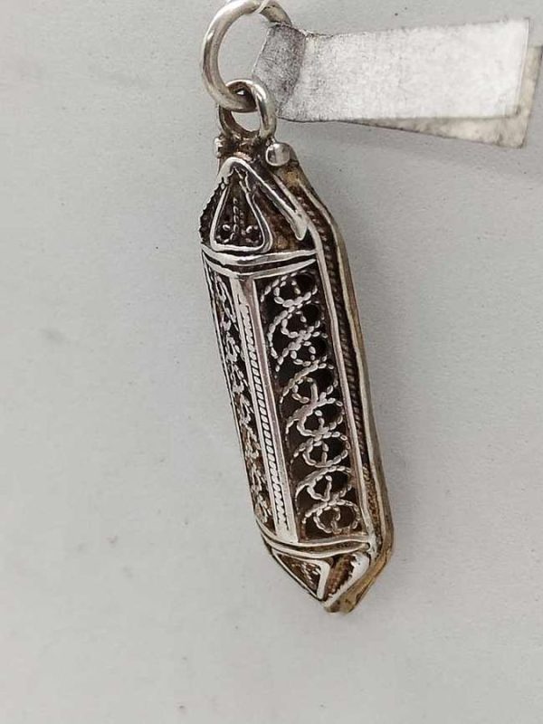 Sterling Silver Mezuzah pendant fine filigree handmade with fine Yemenite filigree triangle shape. Dimension 1 cm X 0.45 cm X 3.1 cm approximately.