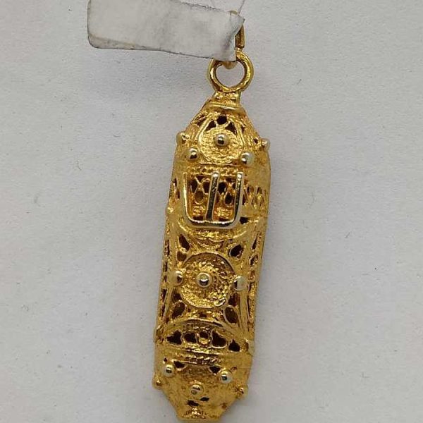 Handmade sterling silver Mezuzah pendant half rounded and gold plated with Yemenite filigree designs. Dimension 1.1 cm X 0.65 cm X 3.4 cm approximately.