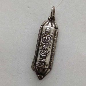Handmade sterling silver Mezuzah pendant vintage made in early 1950's in Israel. Dimension 0.9 cm X 0.5 cm X 3.1 cm approximately.