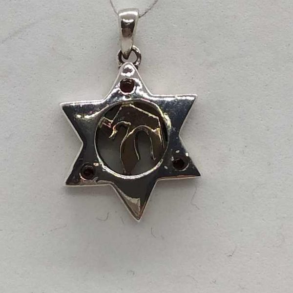 Sterling silver MagenDavid star gold Hay pendant and 14 carat gold Hay set with 3 Garnet stones. Dimension 1.5 cm X 1.65 cm X 0.3 cm.