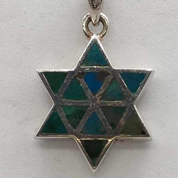 Handmade sterling silver David Star Elat stone Pendant   set with 12 Elat stones triangles shaped in. Dimension 1.65 cm X 2 cm X 0.34 cm.