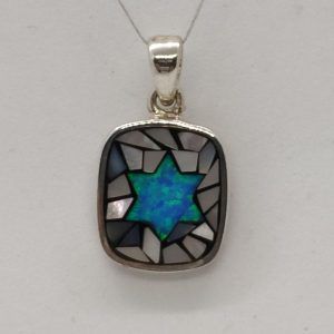 David star Opalite puzzle pendant is set with 1 Opalite stone & pieces of mother of pearl shaped in . Dimension 1.4 cm X 1.65 cm X 0.285 cm.