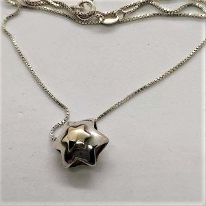 Handmade sterling silver & 14 carat gold Magen David Star 3 Dimension set with a mini 14 carat gold star of David on top.