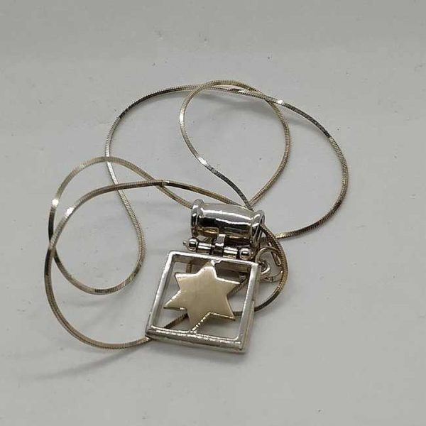 Handmade sterling silver and 14 carat gold MagenDavid Star Square Frame in silver frame with chain. Dimension star 1.6 cm X 1.6 cm X 0.28 cm.
