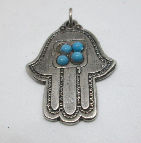 Handmade Hamsa pendant four Turquoise with engravings over massive silver & 4 Turquoise stones 2.4 cm X 3 cm X0.2 cm approximately.