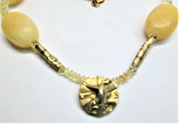 Sterling silver gold plated contemporary design Calcite Citrine Stones Necklace with Calcite & Citrine stones & with 14 carat gold whale clasp.