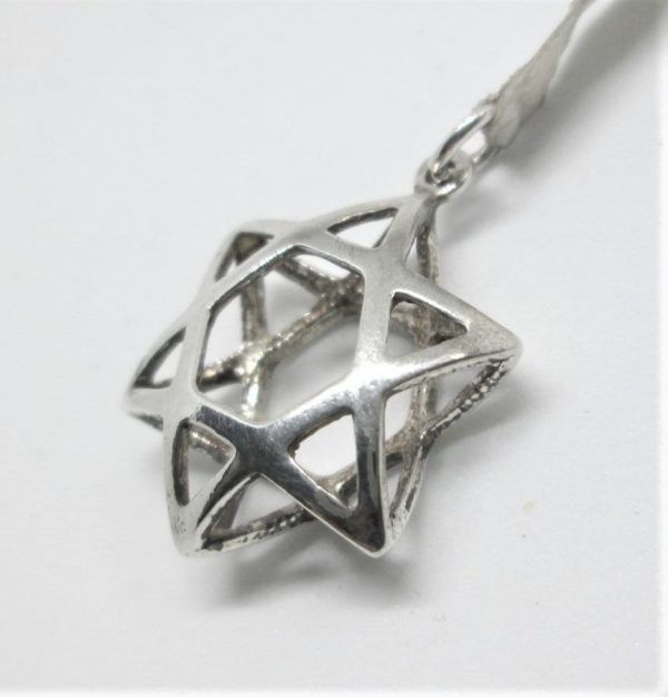 Sterling silver doubled MagenDavid star pendant double sided 3 dimension traditional shape. Dimension 1.7 cm X 2 cm X 0.65 approximately.
