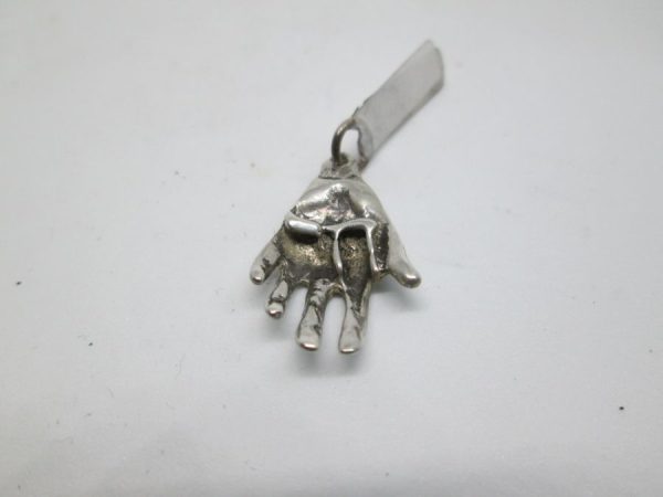 Handmade sterling silver Hamsa Chamsa pendant Chai natural hand shape holding a Chai. Dimension 1.85 cm X 1.4 cm X 0.4 cm approximately.