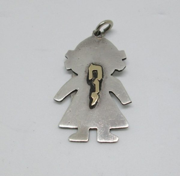 Sterling silver name pendant girl shape made with your name in 14 carat gold Hebrew letters raised on. Dimension 1.5 cm X 2.5 cm approximately.