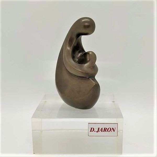 Bronze Sculpture Mother Baby in her lap handmade. Jaron has successfully expressed by metal smoothness warm feelings for child.