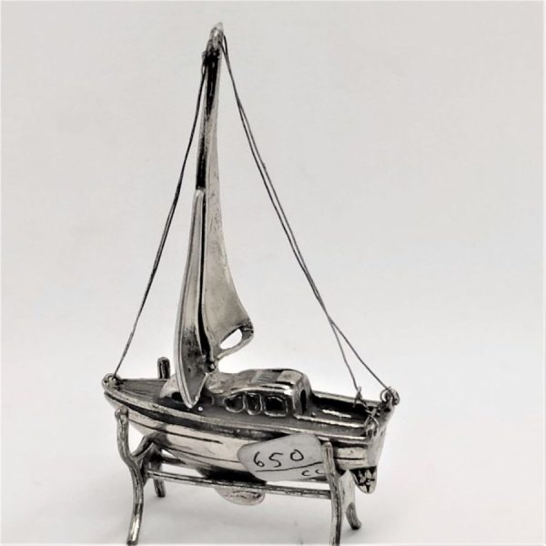 Handmade sterling silver Miniature Sculpture Sailing Boat with separate boat stand. Dimension boat 3.9 cm X 2.8 cm X 6.4 cm.