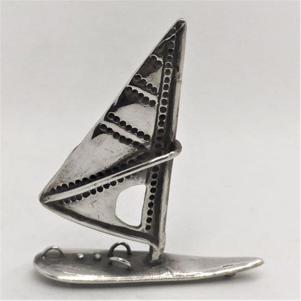 Handmade sterling silver Surfing Board Miniature Sculpture. Dimension 4.5 cm X 1.2 cm X 5.6 cm approximately.