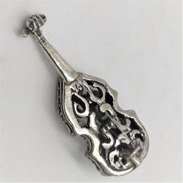 Sterling silver sculptures Miniature Violin Cut Out handmade with option to stand as seen in photos 1.4 cm X 1.6 cm X 4.2 cm approximately.