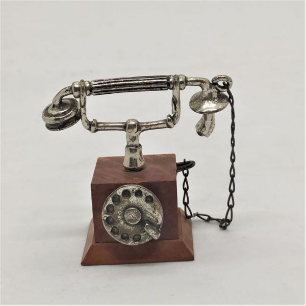 Handmade sterling silver & wood Telephone Wood Silver Miniature sculpture of 20th century wire telephone. Dimension 2.1 cm X 4.5 cm X 4.1 cm approximately.