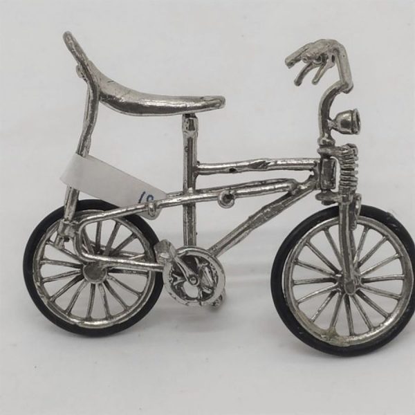 Miniature Bike High Seat sterling silver sculpture and wide range of original and different designs. Dimension 2.8 cm X 5.1 cm X 6.3 cm.