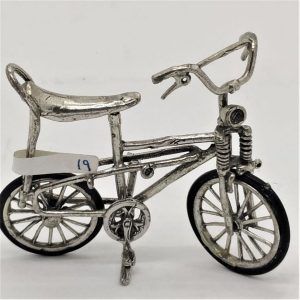 Miniature Bike High Seat sterling silver sculpture and wide range of original and different designs.. Dimension 2.8 cm X 5.1 cm X 6.3 cm.