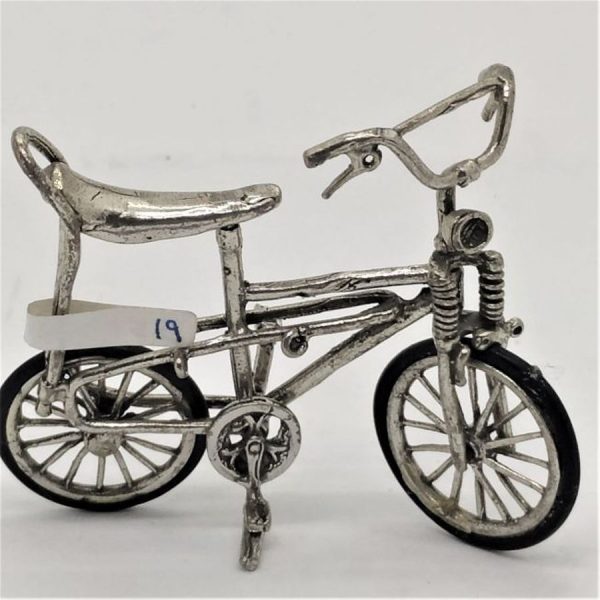 Miniature Bike High Seat sterling silver sculpture and wide range of original and different designs. Dimension 2.8 cm X 5.1 cm X 6.3 cm.