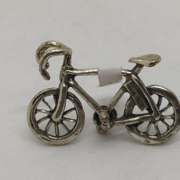 Handmade sterling silver Miniature Sculpture Racing Bikes. Miniature sterling silver sculptures wide range of original and different designs.