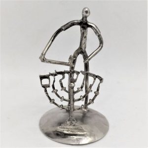 Handmade sterling silver Miniature Hassid Lighting Menorah, while the Menorah flames are made from the letters of Jerusalem in Hebrew.