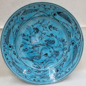 Vintage handmade glazed blue ceramic dish made in Middle East early 20th century. Dimension diameter 21.3 cm X 4.8 cm approximately.