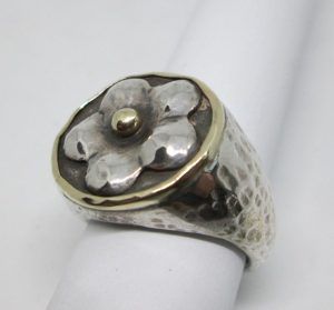 Handmade sterling silver & 14 carat gold contemporary style ring set with flower shape hammered silver diameter 1.8 cm ring size 55.