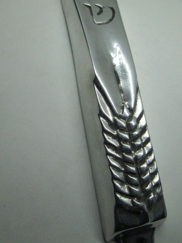 Handmade aluminum Mezuzah wheat leaf design suitable for parchment up to 11 cm. Dimension 3.4 X 16.3 cm approximately.