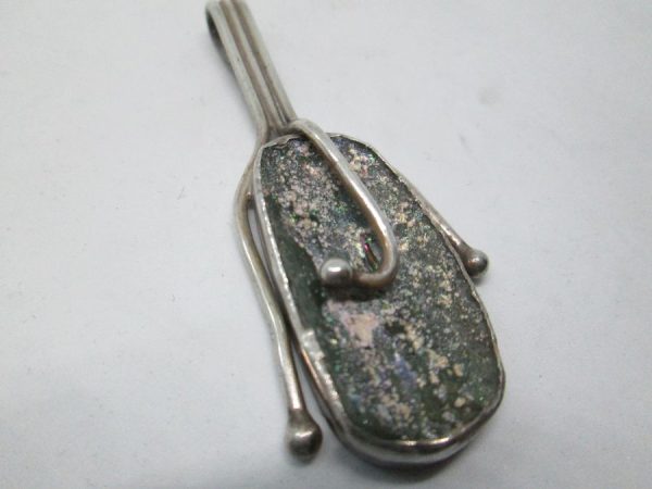 Handmade sterling silver pendant set with genuine Roman glass contemporary style. Dimension 2.2 cm X 5.7 cm approximately.