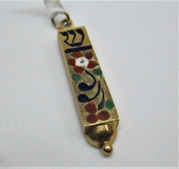 14 Carat gold Mezuzah pendant flowers enamel handmade 14 carat gold Mezuzah pendant with enameled flowers 0.7 cm X 3.3cm approximately.