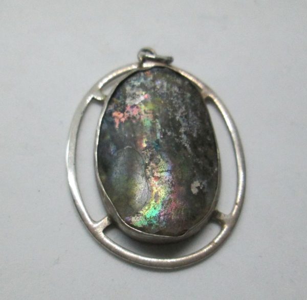 Handmade sterling silver Roman glass pendant oval shape set with genuine Roman glass contemporary style. Dimension 2.9 cm X 3.6 cm approximately.