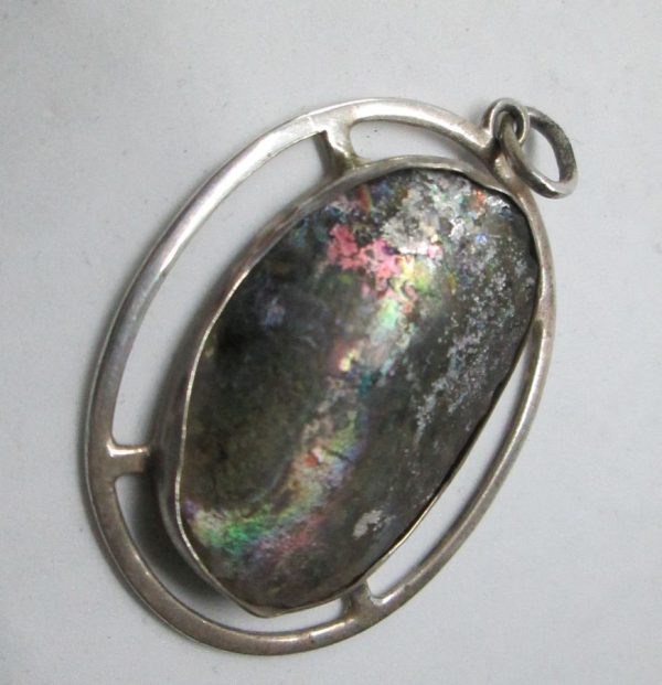 Handmade sterling silver Roman glass pendant oval shape set with genuine Roman glass contemporary style. Dimension 2.9 cm X 3.6 cm approximately.
