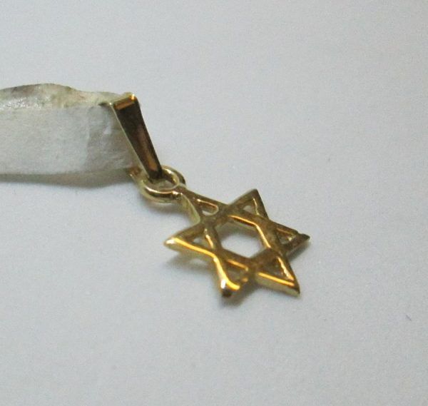 Handmade 14 carat yellow gold star pendant classic mini size can be made in sterling silver by order 0.8 cm X 0.95 cm X 0.08 cm approximately.