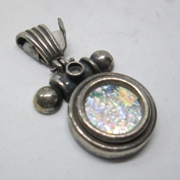 Handmade sterling silver Roman glass pendant round shape set with genuine Roman glass contemporary style. Dimension 2.1 cm X 3.8 cm approximately.