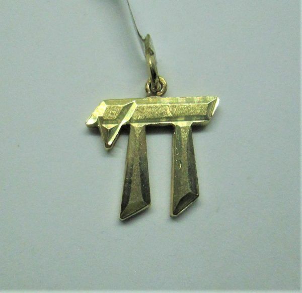 14 carat gold Hay Solid Gold Pendant with diamond cut and sand polish. Dimension 2 cm X 1.75 X 0.25 cm approximately.