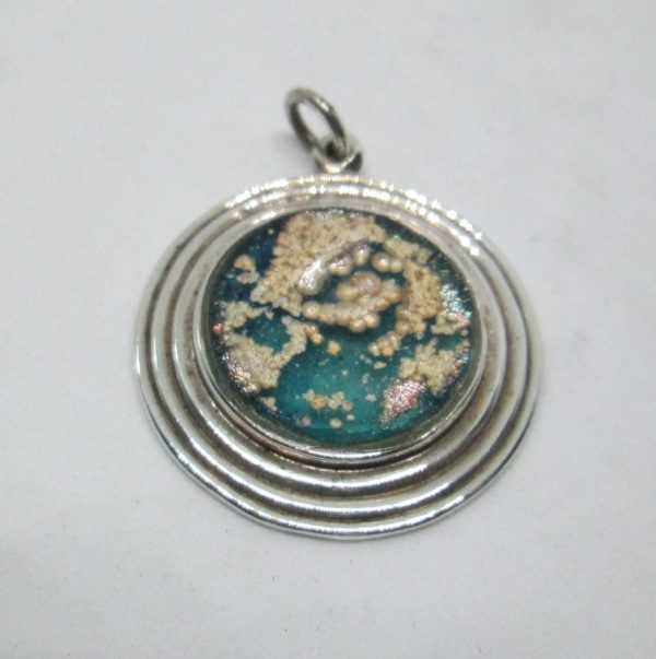 Round Roman glass pendant is surrounded with three round sterling silver wires handmade. Dimension diameter 2.7 cm approximately.
