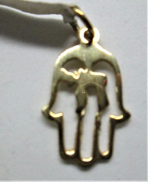 Handmade 14 carat gold Hamsa Hay cut out pendant with cut out Hay in center. Dimension 1.2 cm X 1.6 cm X 0.08 approximately.