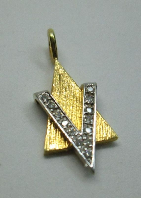 18 Carat white & yellow gold star MagenDavid pendant 13 Diamond set with genuine white diamonds 8 pts, VVS clarity.