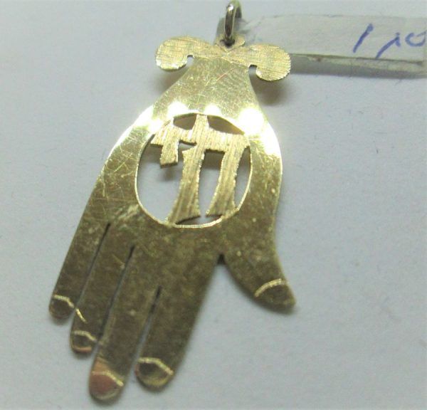 Handmade 14 carat gold Chamsa Hay pendant with cut out Hay in center. Dimension 1.7 cm X 3.25 cm X 0.035 approximately.