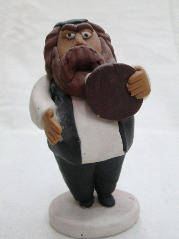 Handmade fimo ceramic a Chasid Rabbi playing tambourine made by Yuri. Dimension 6 cm X 11.5 cm X 5 cm approximately.