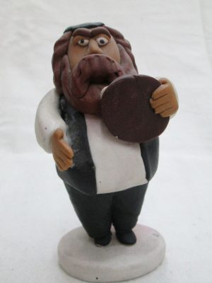 Handmade humoristic fimo ceramic a Chasid Rabbi playing tambourine made by Yuri. Dimension 6 cm X 11.5 cm X 5 cm approximately.