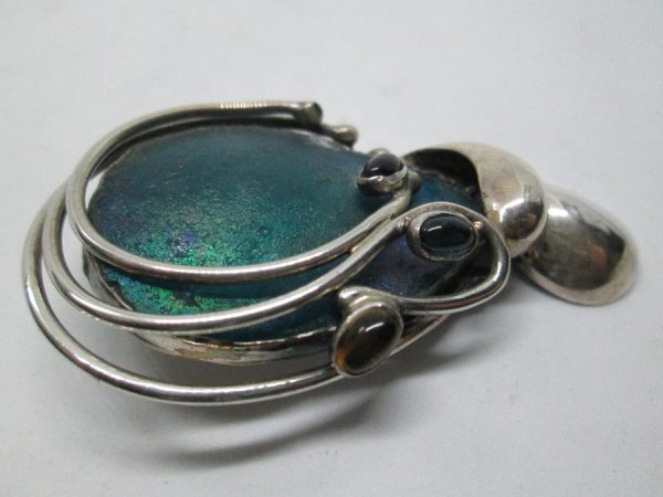 Handmade sterling silver Roman glass abstract pin and pendant set with genuine Roman glass contemporary style made by T Perez 3.7 cm X 6.2 cm approximately.