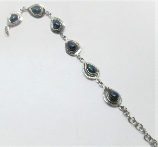 Sterling silver bracelet Azurite drops silver handmade set with cabochon Azurite stones. Dimension 1.4 cm X 20.5 cm approximately.