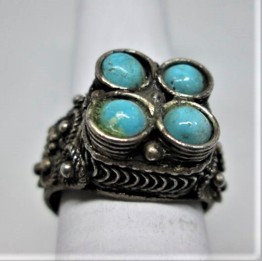 Vintage Yemenite filigree ring four Turquoise stones made in Israel in the 1950's by Yemenite Jews. Dimension 1.35 cm X 1.35 cm ring size 57.