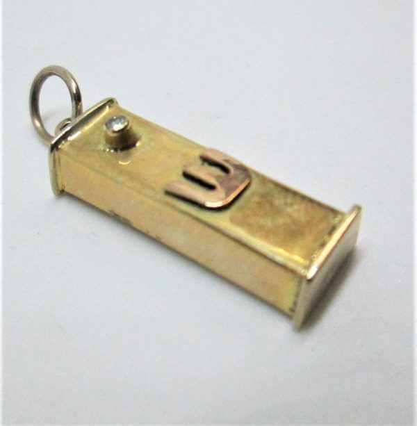14 carat gold Mezuzah pendant diamond set in with a genuine 1 pts. weight diamond below the Shin raised letter set made by S.Ghatan (Katan).