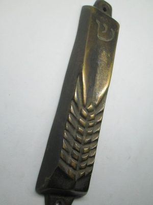 Handmade bronze Mezuzah wheat leaf design suitable for parchment up to 11 cm. Dimension 3.4 X 16.3 cm approximately.